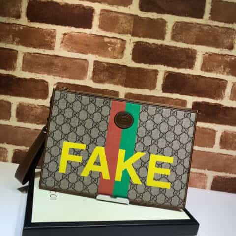GUCCI古驰“Fake/Not”印花手拿包636171