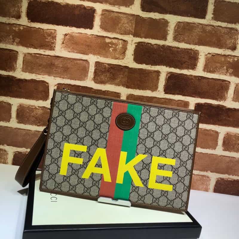 GUCCI古驰“Fake/Not”印花手拿包636171