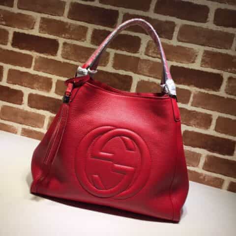 GUCCI古驰女士牛皮时尚双G浮雕纯色手提包282309