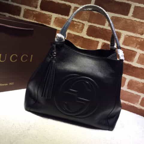 GUCCI古驰女士牛皮时尚双G浮雕纯色手提包282309