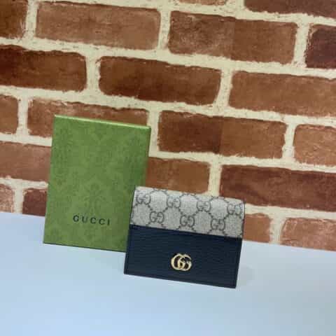 GUCCI古驰啡Pvc拼皮女士短夹658610