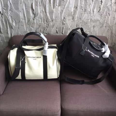 Balenciaga巴黎世家帆布配牛皮旅行袋