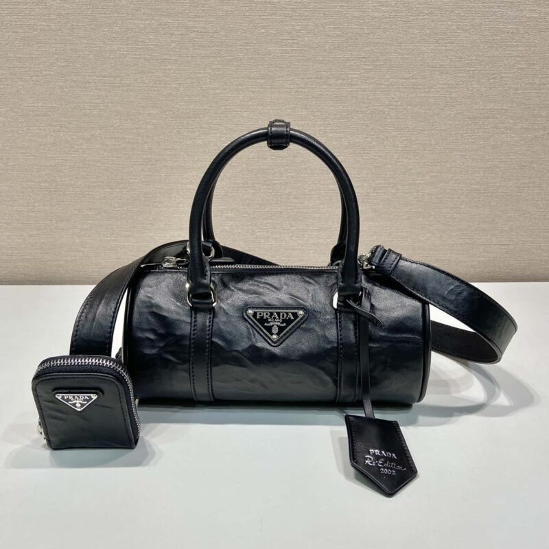 PRADA普拉达里外全软羊革新款枕头包1BA389