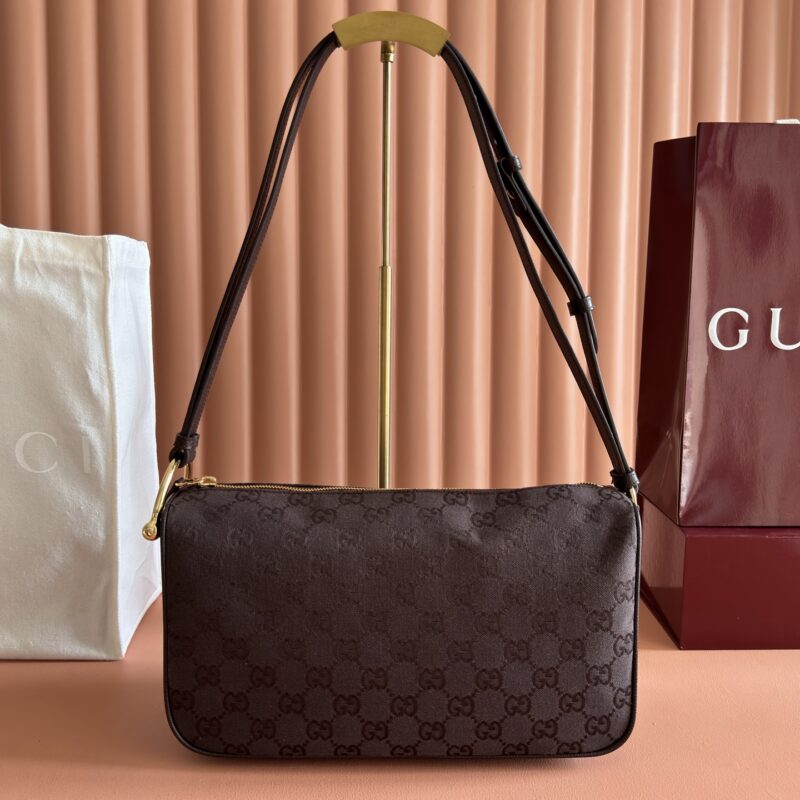 GUCCI 焕新呈现Gucci Half Horsebit系列 型号:860787 深棕色帆布/棕色