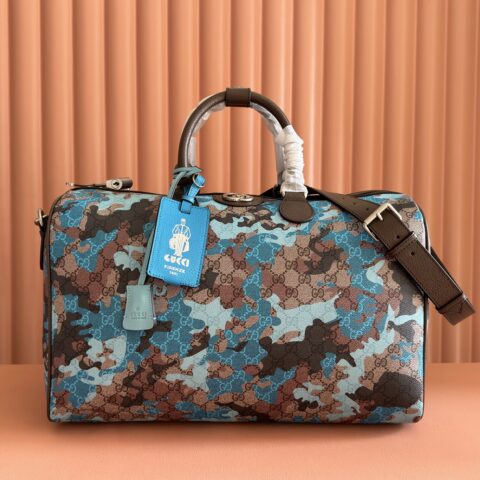 GUCCI 旅行包以大理石纹GG字母图案涂层织物打造 型号:834460 兰迷彩/pvc