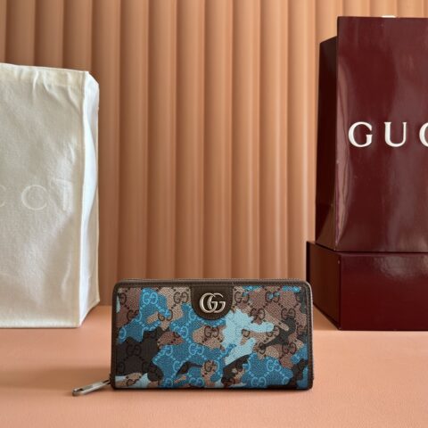 GUCCI 全拉链钱包以大理石纹GG字母图案涂层织物打造 型号:834694 兰迷彩/pvc