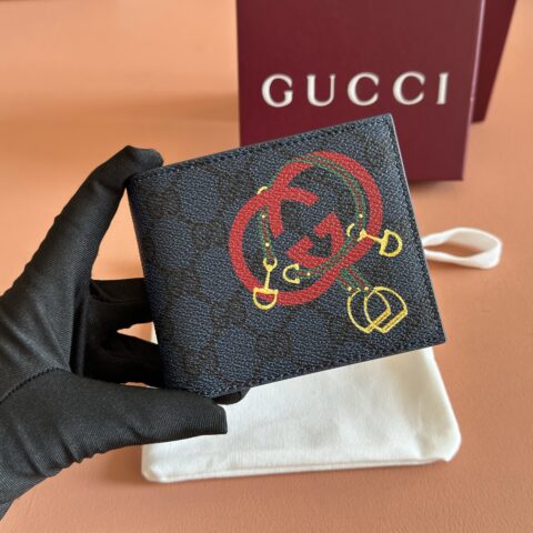 GUCCI GG Supreme打造的双折钱包 型号：853434蓝胶/马镫