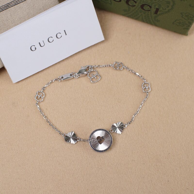 GUCCI 镭射圆饼镂空心形手链