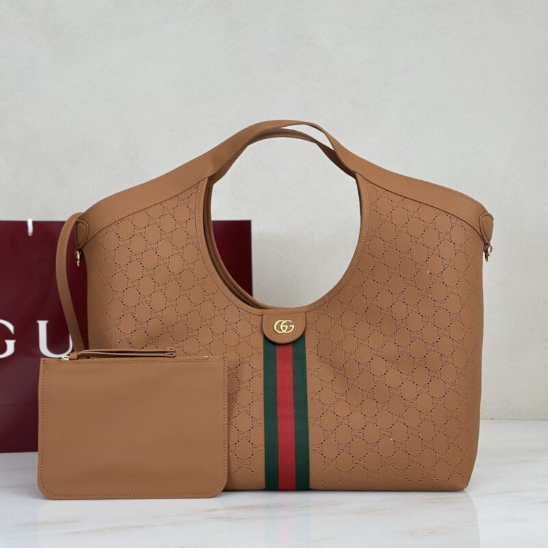 Gucci 款号853971 棕皮穿孔